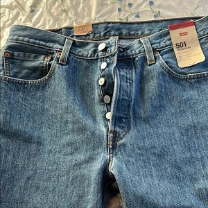 Levi's Classic Blue Straight 501 Jeans with Textured Denim. Button fly